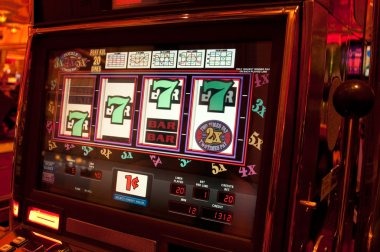 Multiple mobile devices displaying the apibet platform with live-dealer blackjack, sportsbook betting interface, and live casino table gameplay
